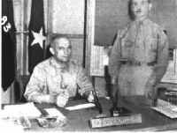 Major General John Millikin (seated) and Col. W. B. Bradford, chief of staff