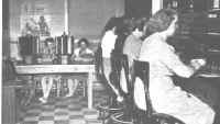 On duty in the operating room at Camp Atterbury are, l-r: Darlene Baker and Genevieve Morford, at information files; Virginia Homsher, Ruth King, Hester Reddie and Ruth Brooks.
