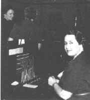 Carolyn Freeman operates the PBX board.